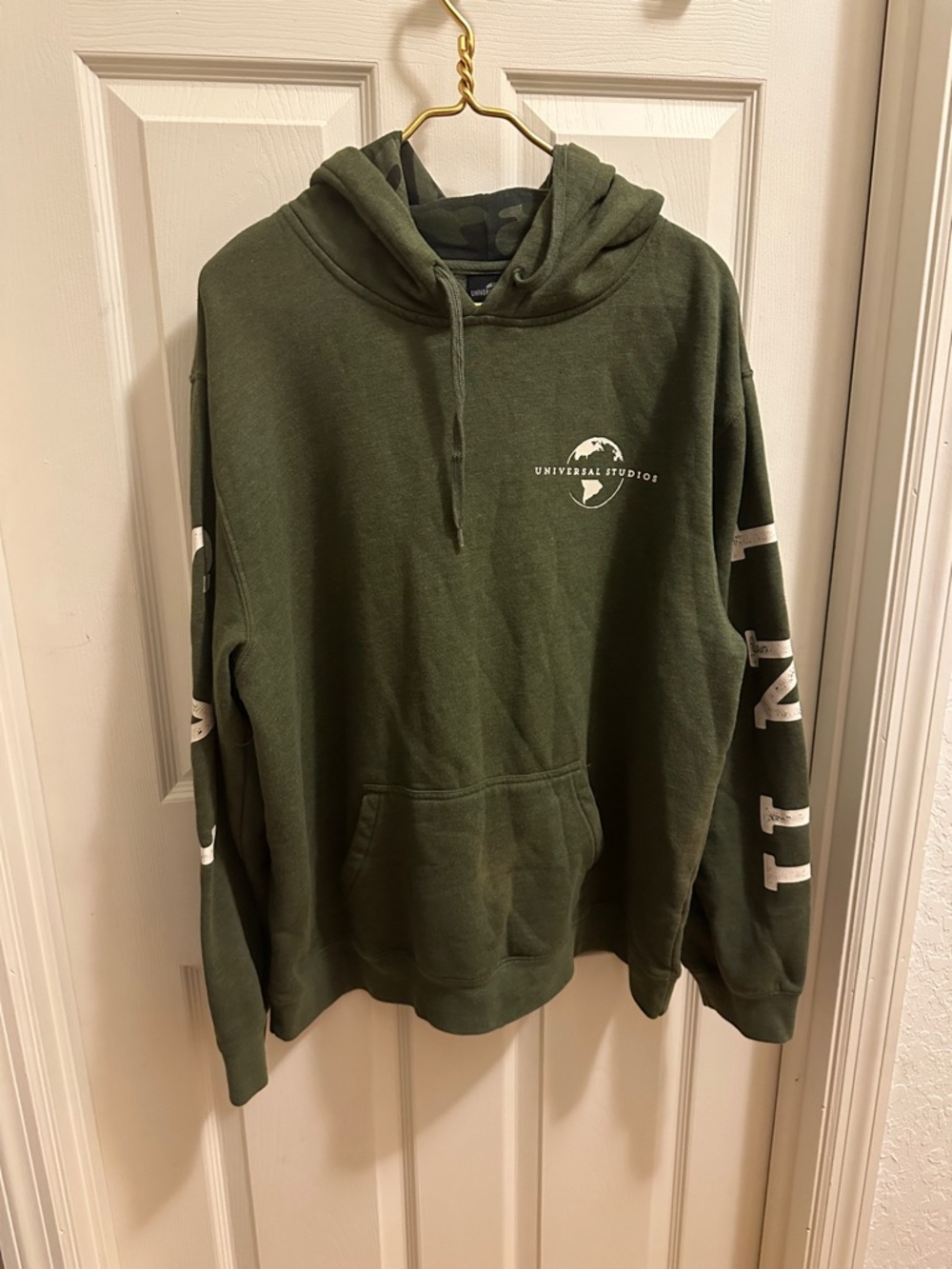 Universal Studios Olive Green Pullover Hoodie with White Sleeve Text
